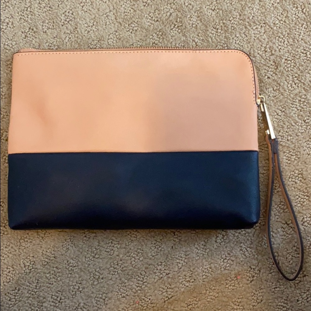 Tan and navy wristlet